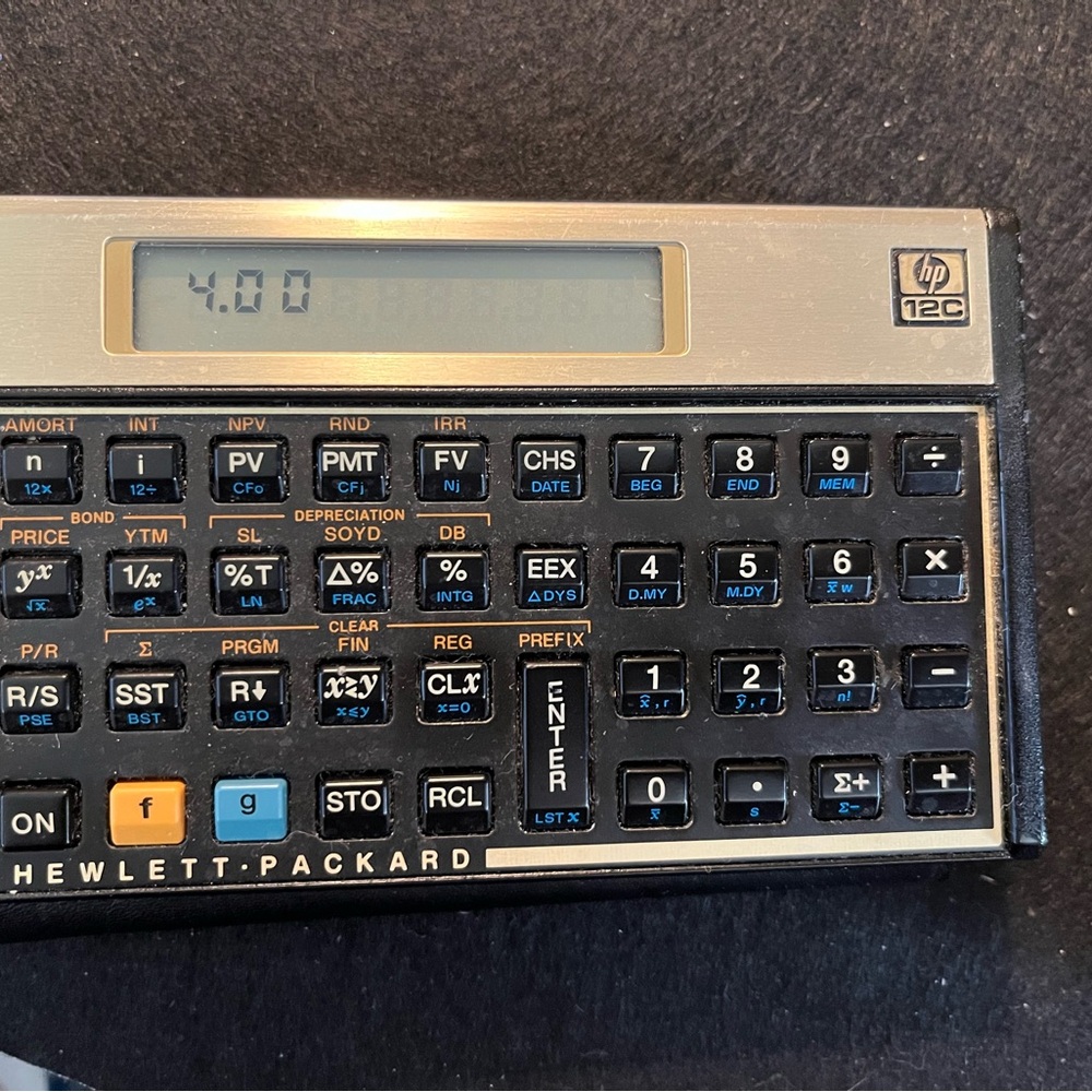 Vintage HP 12C Calculator - Black and Gold